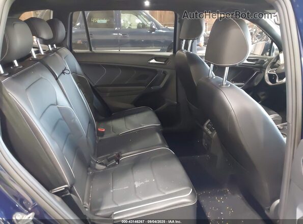 3VV4B7AX6NM100884 2022 VOLKSWAGEN TIGUAN Blue Vista de la etiqueta del VIN