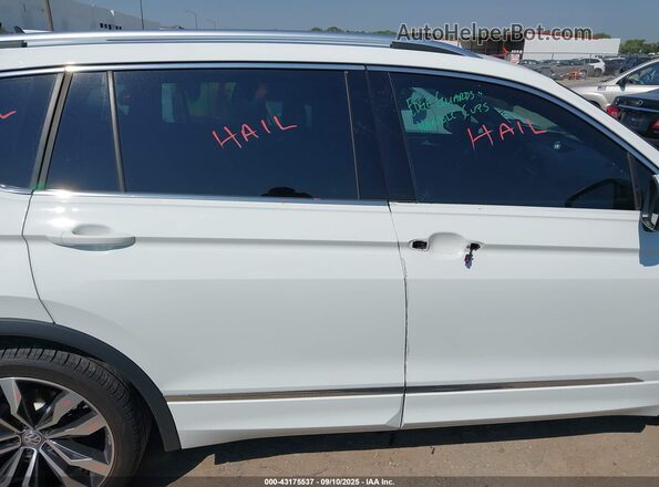 3VV4B7AX9MM157188 2021 VOLKSWAGEN TIGUAN White Vista interior trasera