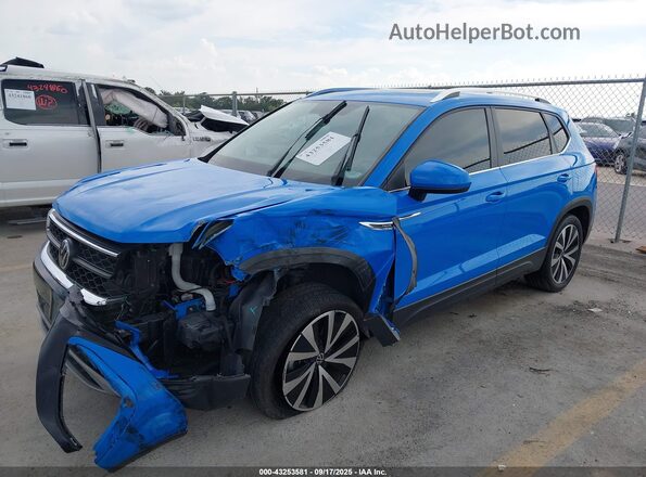 3VVEX7B25PM314308 2023 VOLKSWAGEN TAOS Blue Przód lewy