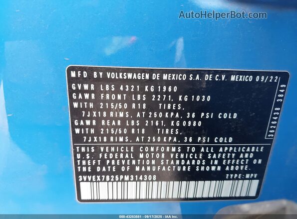 3VVEX7B25PM314308 2023 VOLKSWAGEN TAOS Blue Widok komory silnika