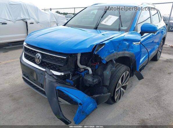 3VVEX7B25PM314308 2023 VOLKSWAGEN TAOS Blue Widok z przodu