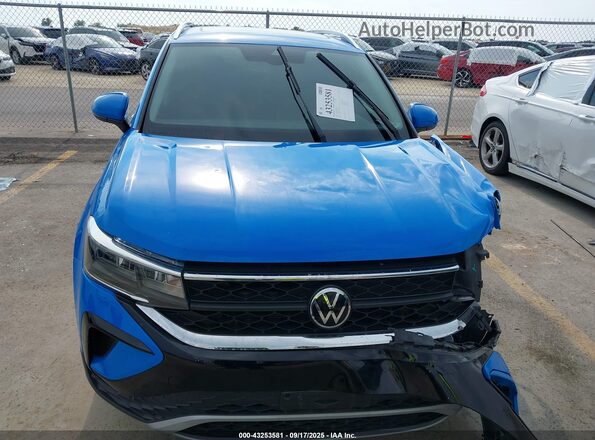 3VVEX7B25PM314308 2023 VOLKSWAGEN TAOS Blue Widok wnętrza z tyłu