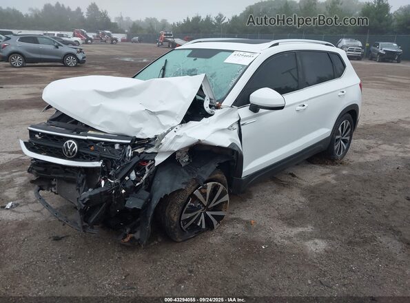 3VVLX7B22NM076308 2022 VOLKSWAGEN TAOS White Vista tres cuartos delantera izquierda