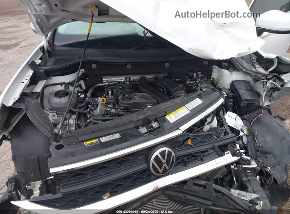 3VVLX7B22NM076308 2022 VOLKSWAGEN TAOS White Vista trasera
