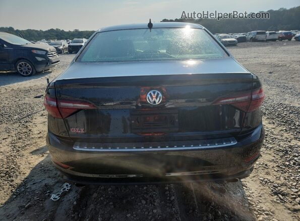 3VW6T7BUXMM104201 2021 VOLKSWAGEN JETTA Black Rear view
