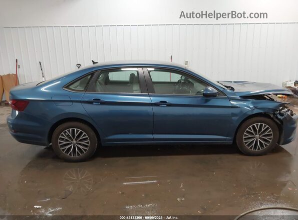 3VWC57BU8MM067873 2021 VOLKSWAGEN JETTA Blue Սալոնի հետևի տեսք