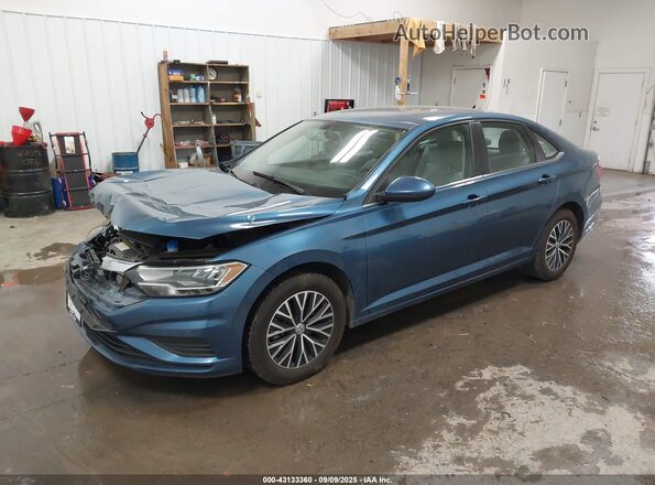 3VWC57BU8MM067873 2021 VOLKSWAGEN JETTA Blue Առջևի ձախ երեք քառորդ տեսարան