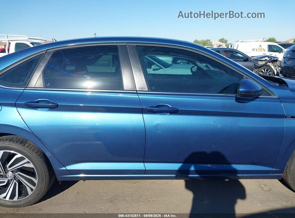 3VWE57BU0MM098754 2021 VOLKSWAGEN JETTA Blue Սալոնի հետևի տեսք