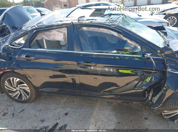 3VWG57BU3MM097977 2021 VOLKSWAGEN JETTA Black Vista interior trasera