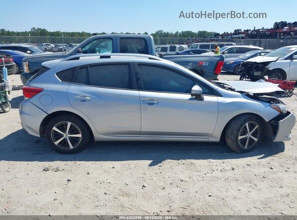 4S3GTAD62P3716997 2023 SUBARU IMPREZA Silver Սալոնի հետևի տեսք