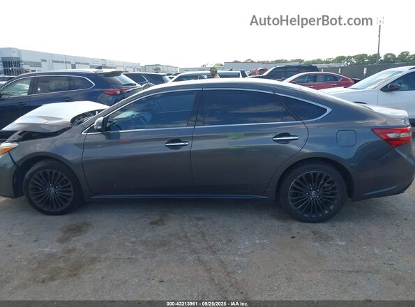 4T1BK1EB9JU286973 2018 TOYOTA AVALON Gray Widok wnętrza z tyłu