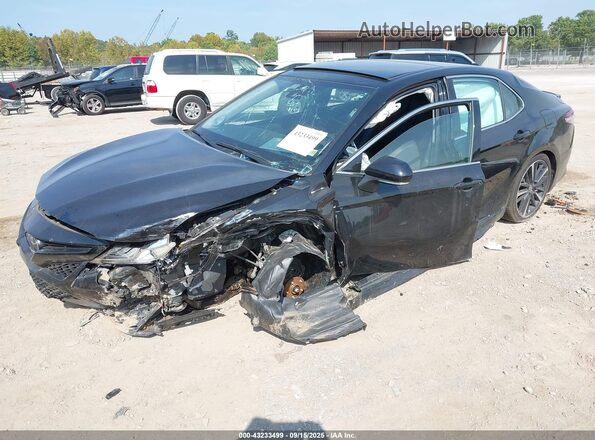 4T1K61AK4LU385584 2020 TOYOTA CAMRY Black Front view