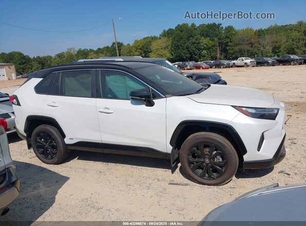 4T3E6RFV9RU175318 2024 TOYOTA RAV4 White Rear interior view