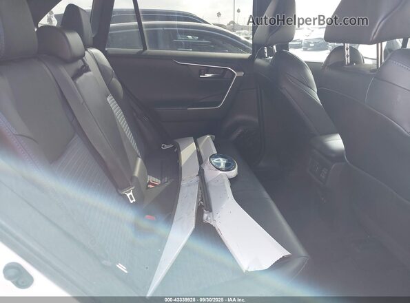 4T3E6RFVXMU027297 2021 TOYOTA RAV4 HYBRID Белый Вид наклейки с VIN-кодом