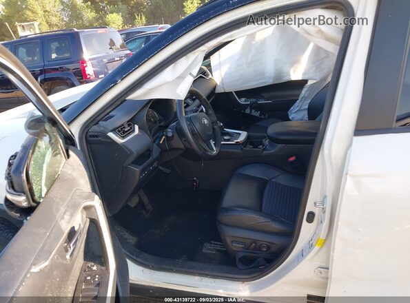 4T3EWRFV8LU010142 2020 TOYOTA RAV4 HYBRID Белый Вид салона спереди