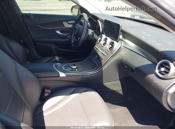 55SWF8DB4LU327220 2020 MERCEDES-BENZ C-CLASS Silver Front interior view