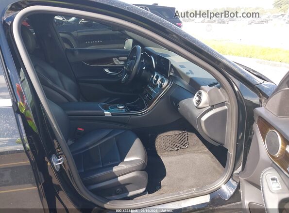55SWF8DB5LU325993 2020 MERCEDES-BENZ C-CLASS Black Front interior view
