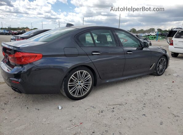 WBAJB9C53JB286164 2018 BMW M5 Серый Передняя правая четверть