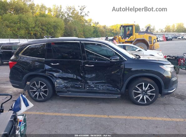 5FNYF5H94LB009548 2020 HONDA PILOT Black Rear interior view
