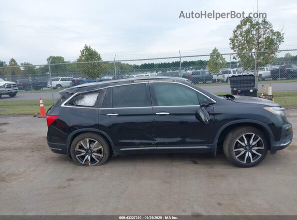 5FNYF6H05LB061696 2020 HONDA PILOT Black Widok wnętrza z tyłu