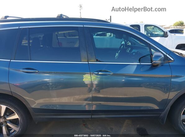 5FNYF6H27NB028574 2022 HONDA PILOT Navy Vista interior trasera
