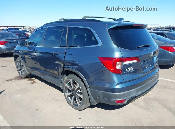 5FNYF6H27NB028574 2022 HONDA PILOT Navy Trasero izquierdo