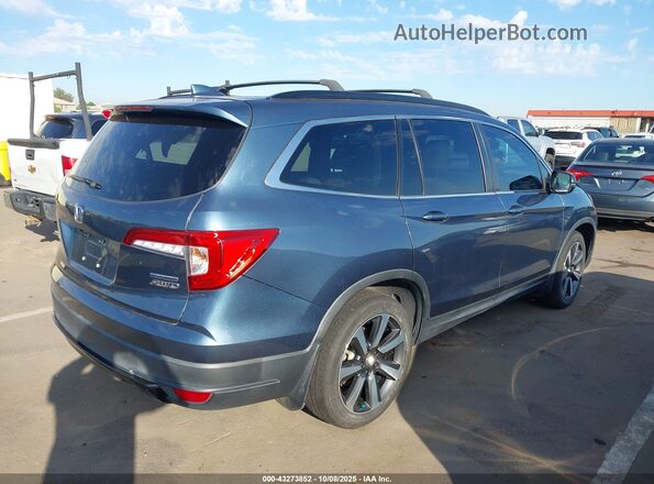 5FNYF6H27NB028574 2022 HONDA PILOT Navy Trasero derecho