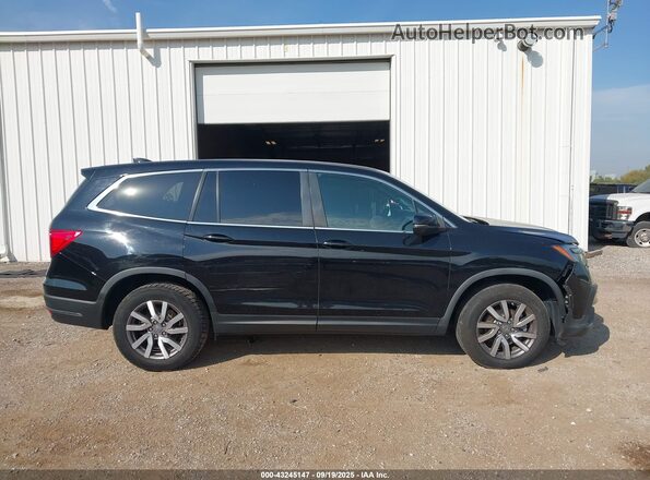 5FNYF6H57LB069231 2020 HONDA PILOT Черный Вид задней части салона