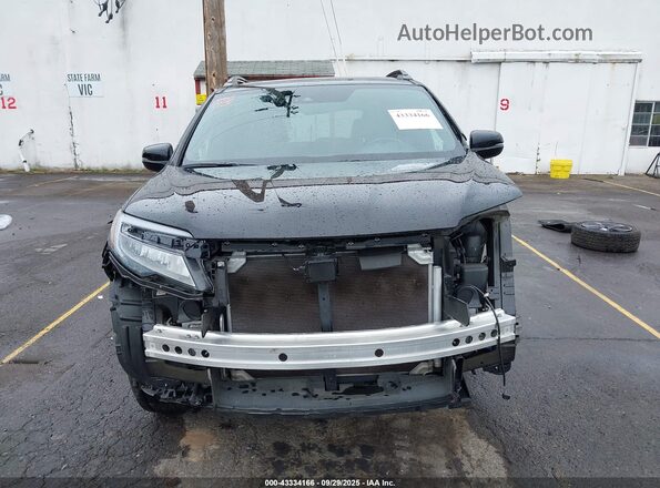 5FNYF8H07MB012125 2021 HONDA PASSPORT Black Widok wnętrza z tyłu
