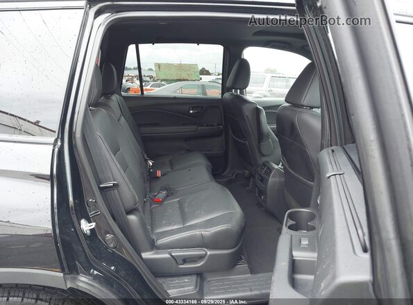 5FNYF8H07MB012125 2021 HONDA PASSPORT Black Widok naklejki z numerem VIN