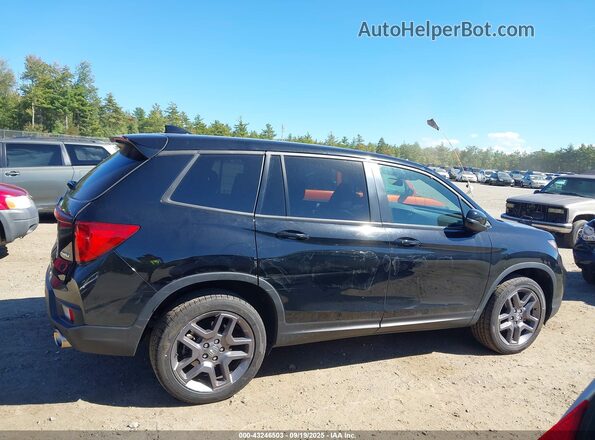 5FNYF8H54PB013071 2023 HONDA PASSPORT Black Widok wnętrza z tyłu
