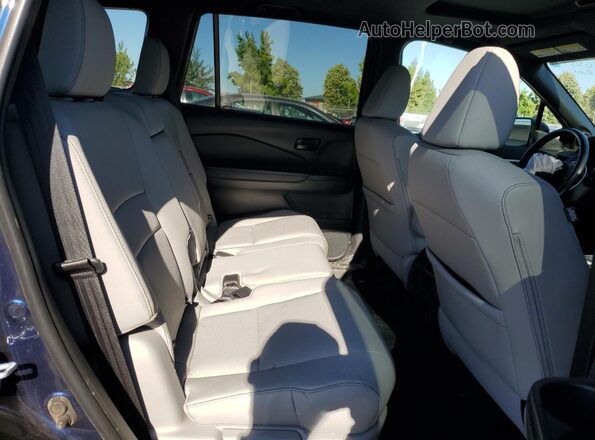 5FNYF8H55NB024139 2022 HONDA PASSPORT Blue Rear interior view