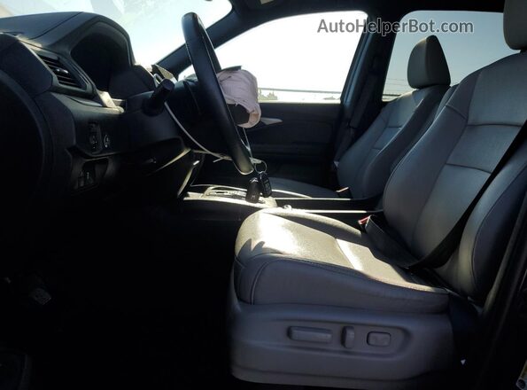 5FNYF8H55NB024139 2022 HONDA PASSPORT Blue Front interior view
