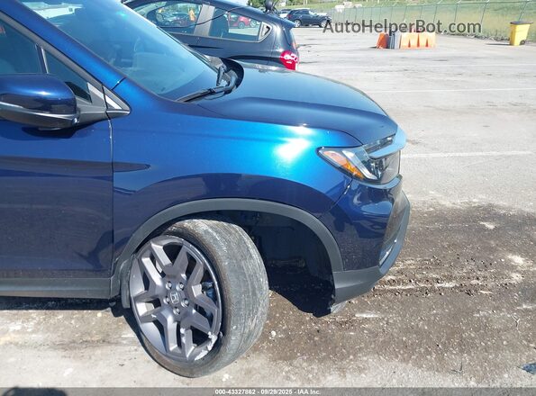 5FNYF8H57PB017891 2023 HONDA PASSPORT Blue Front view