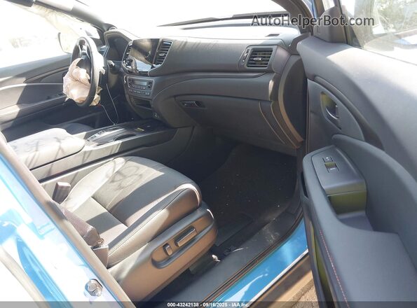5FNYF8H64SB002850 2025 HONDA PASSPORT Blue Widok wnętrza z przodu
