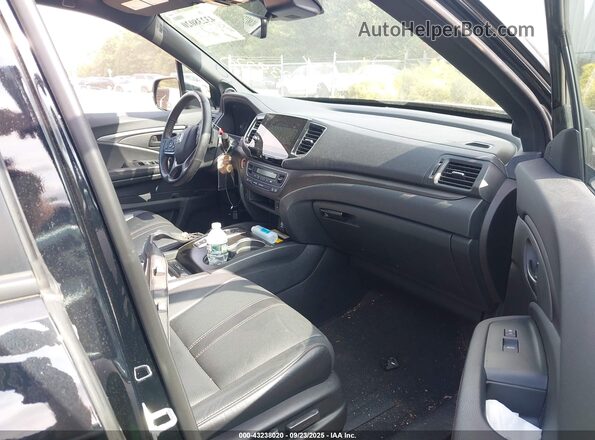 5FNYF8H69PB042641 2023 HONDA PASSPORT Black Widok wnętrza z przodu