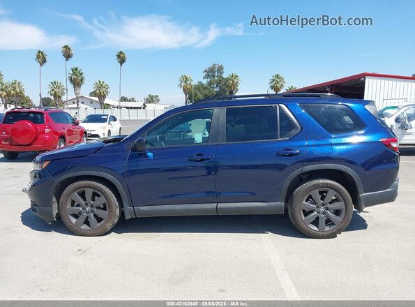 5FNYG1H39PB037837 2023 HONDA PILOT Blue Widok wnętrza z tyłu