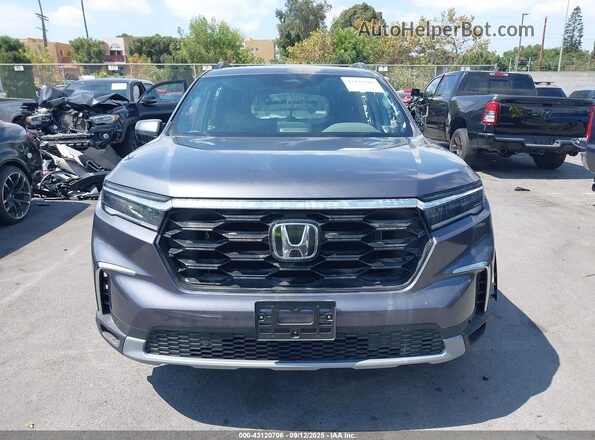 5FNYG2H71SB005076 2025 HONDA PILOT Gray Widok wnętrza z tyłu