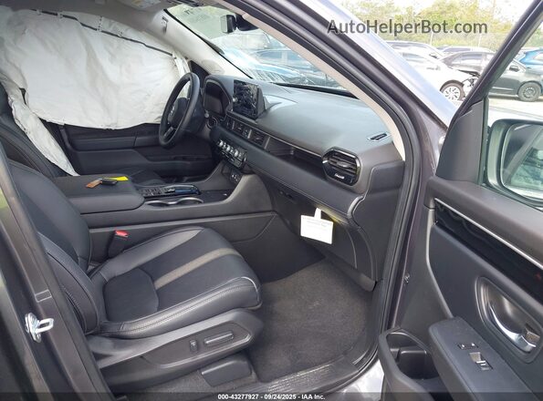 5FNYG2H76PB008790 2023 HONDA PILOT Серый Вид салона спереди
