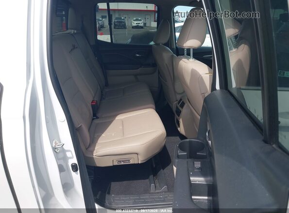 5FPYK3F57PB059308 2023 HONDA RIDGELINE White VIN կոդի պիտակի տեսք