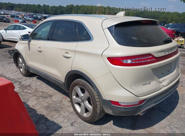 5LMCJ1C95JUL01053 2018 LINCOLN MKC Желто-коричневый 