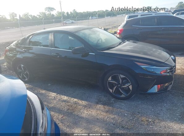 5NPLP4AG5MH023276 2021 HYUNDAI ELANTRA Black Widok wnętrza z tyłu