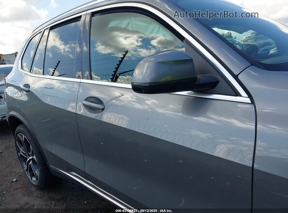 5UX13EU01R9V12165 2024 BMW X5 Silver Rear interior view