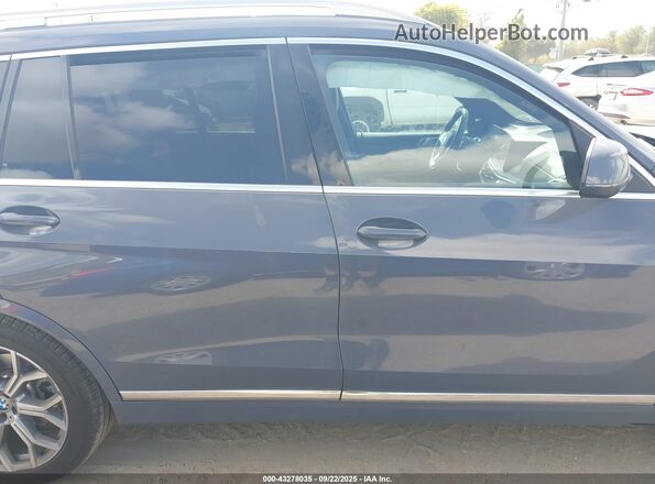 5UX23EM02P9R91424 2023 BMW X7 Gray Սալոնի հետևի տեսք