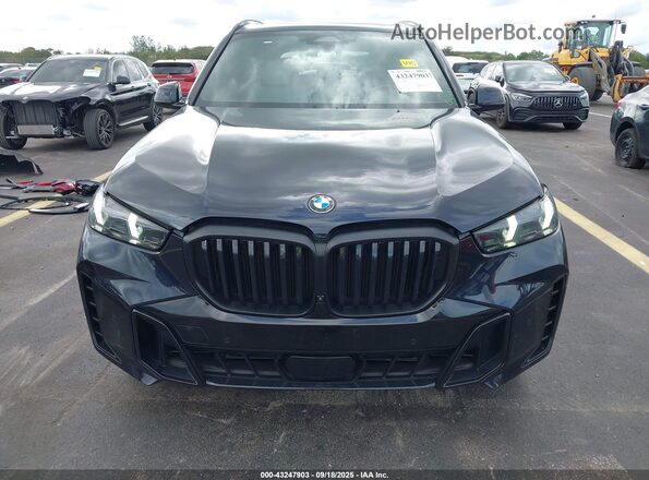 5UX23EU04R9V06803 2024 BMW X5 Dark Blue Rear interior view