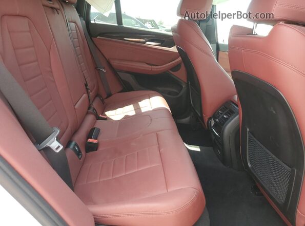 5UX2V1C05M9F94289 2021 BMW X4 White Widok wnętrza z tyłu