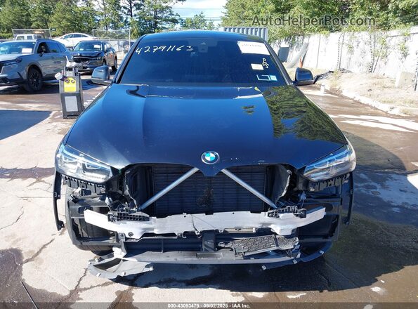 5UX33DT00R9T88295 2024 BMW X4 Black Widok wnętrza z tyłu