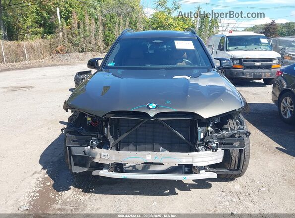 5UX33EM02S9W92626 2025 BMW X7 Green Vista interior trasera