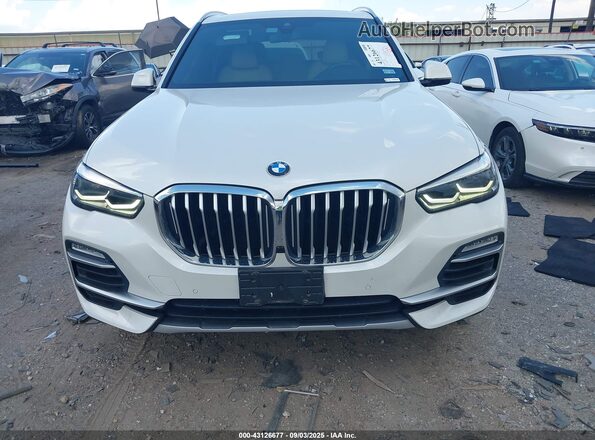 5UXCR6C01L9B19243 2020 BMW X5 White Instrument cluster view