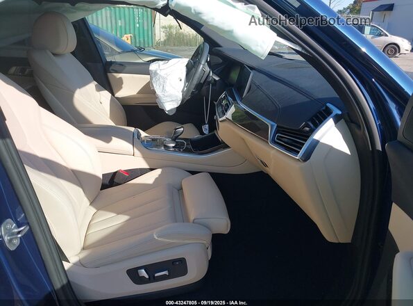 5UXCR6C07N9N32963 2022 BMW X5 Blue Front interior view